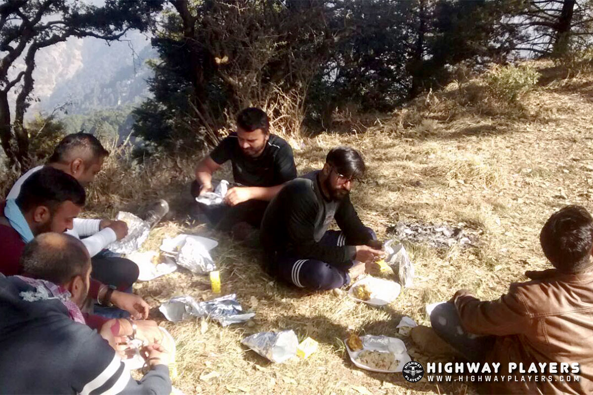 Highway Players doint lunch at Naina Peak (China Peak)